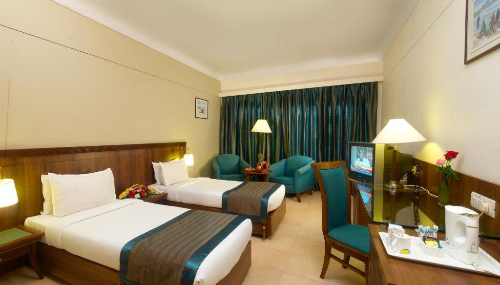 Uday Suites - The Airport Hotel Thiruvananthapuram Zimmer foto